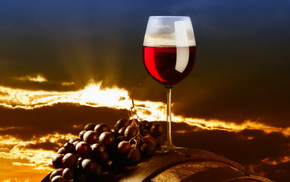 vino_rosso_botte_tramonto